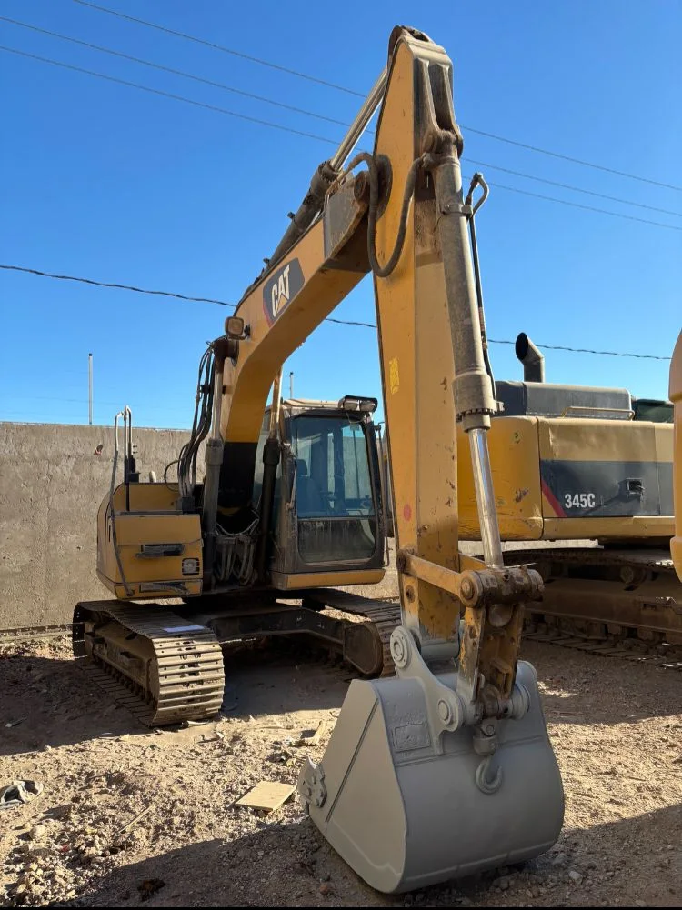 «Troyano» #38 — excavadora 311D frontal con bote